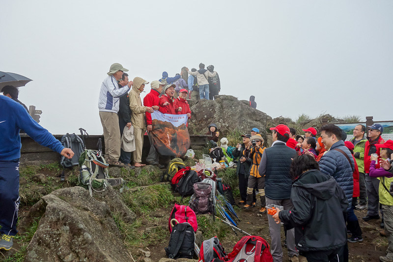 Taiwan-Taipei-Hiking-Yangmingshan - Now I am at the main peak, which is like 5 metres higher than the eastern peak. Theres some sort of mountain climbing group up here going crazy with c